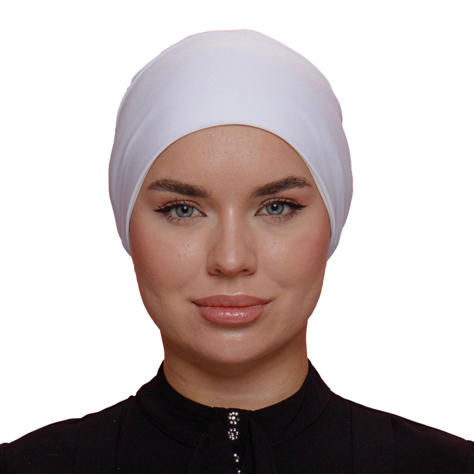 Front view of a woman wearing a white lycra underscarf. Stretchable and breathable fabric designed for all-day comfort and hijab security.
