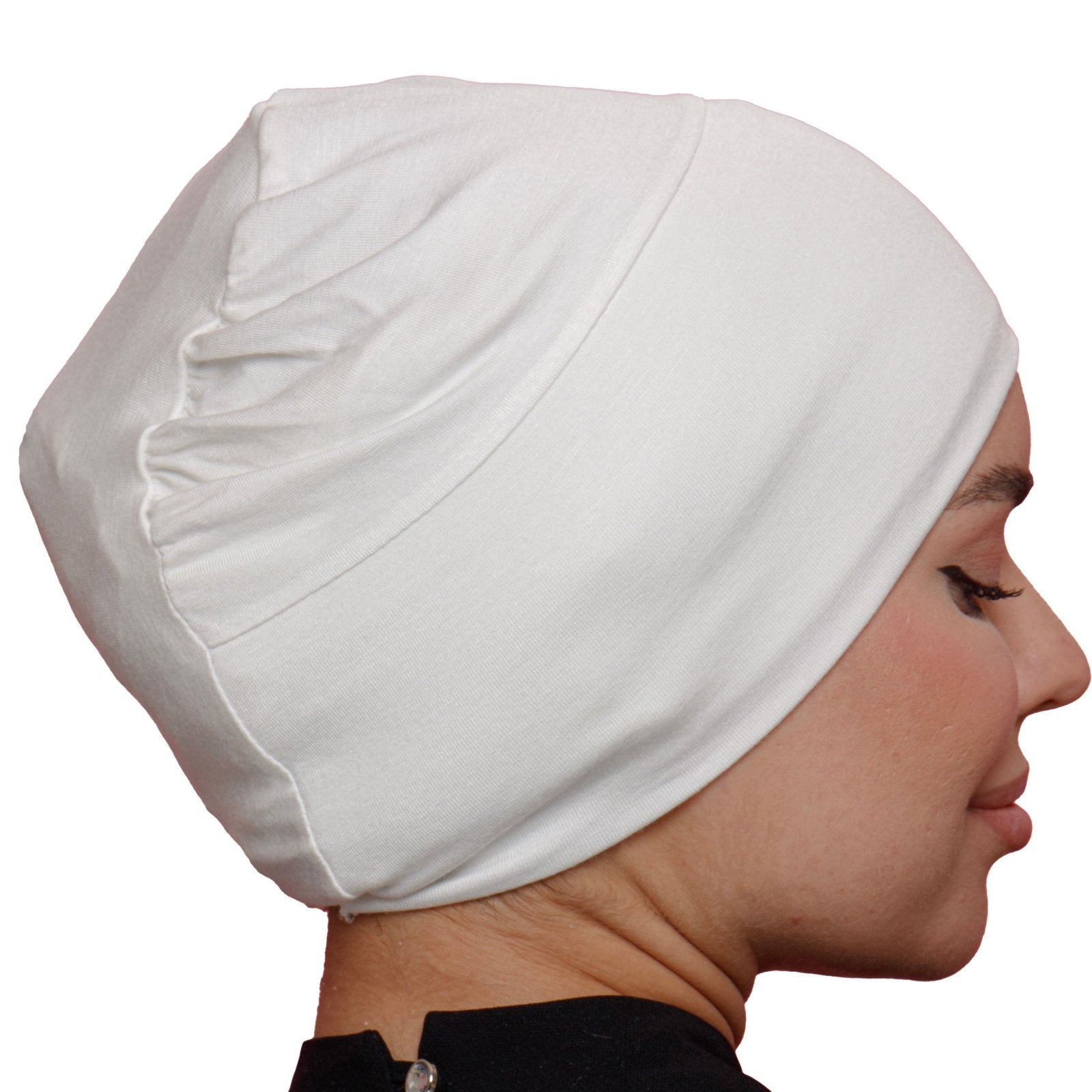 Back view of a woman in a white underscarf with gathered detailing. Perfect for providing volume under hijabs while maintaining comfort
