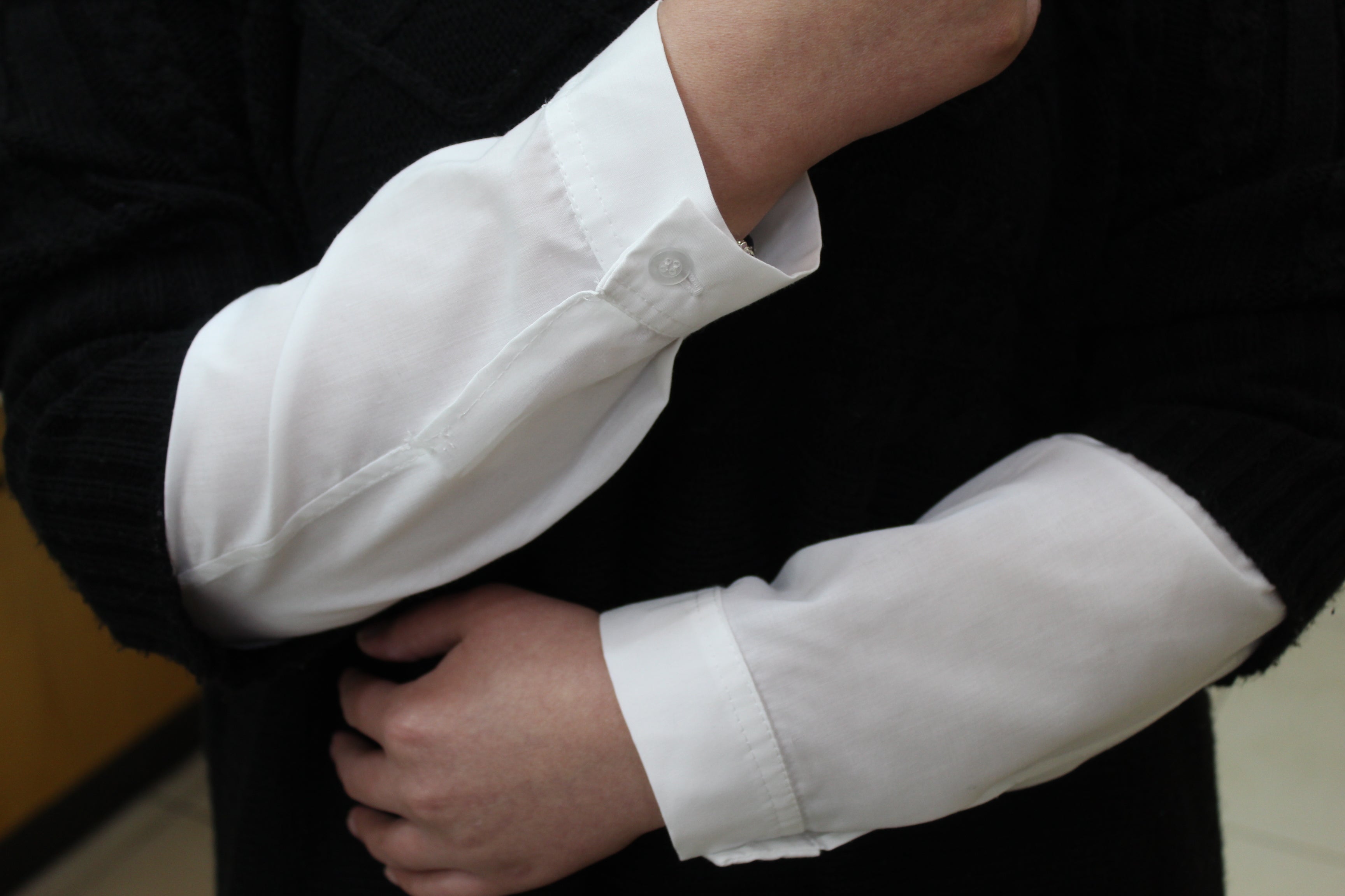 White cotton wrist extensions designed for full coverage and comfort