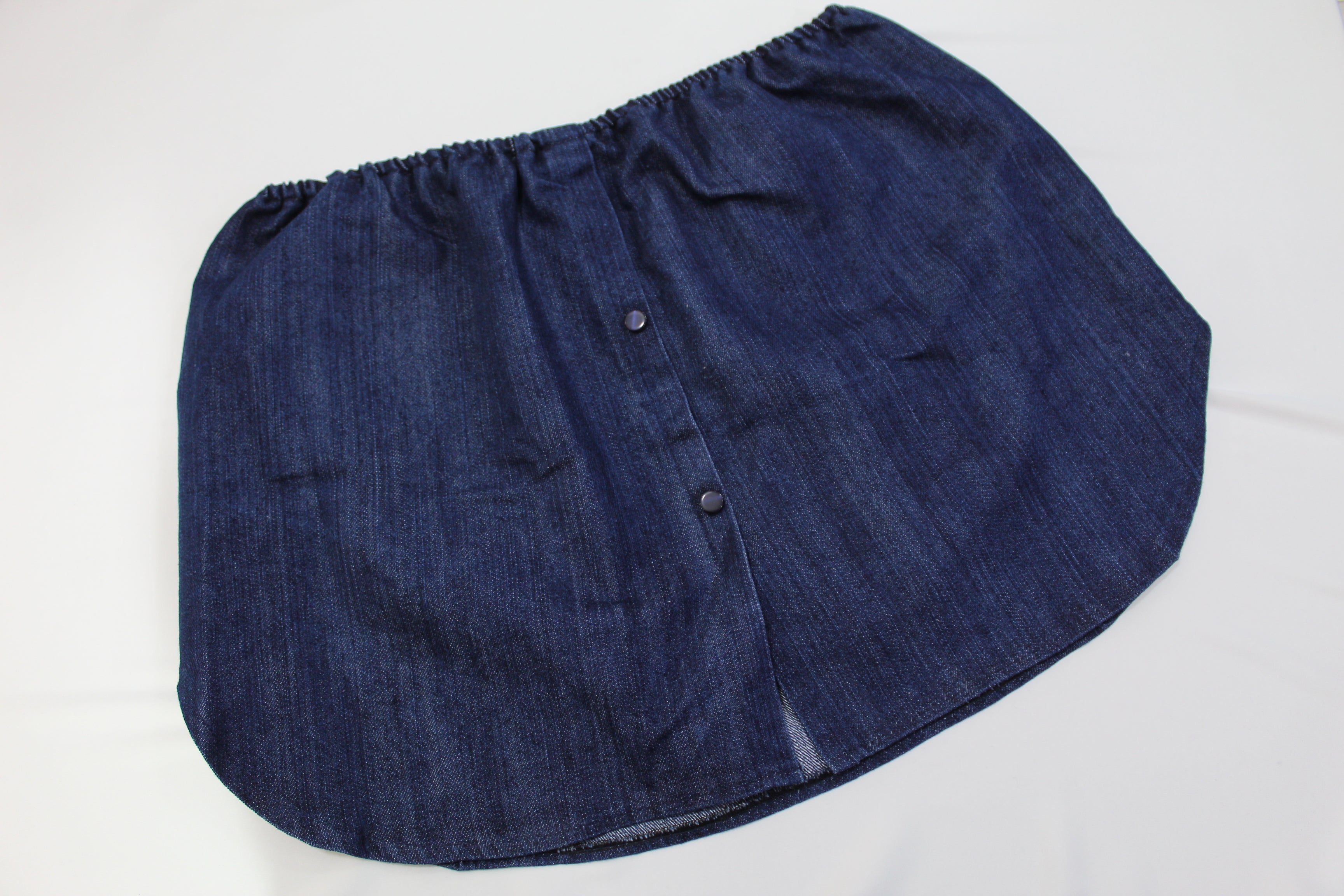 Casual streetwear featuring a long cardigan paired with light jeans, ideal for a relaxed yet modest look, extension skirt