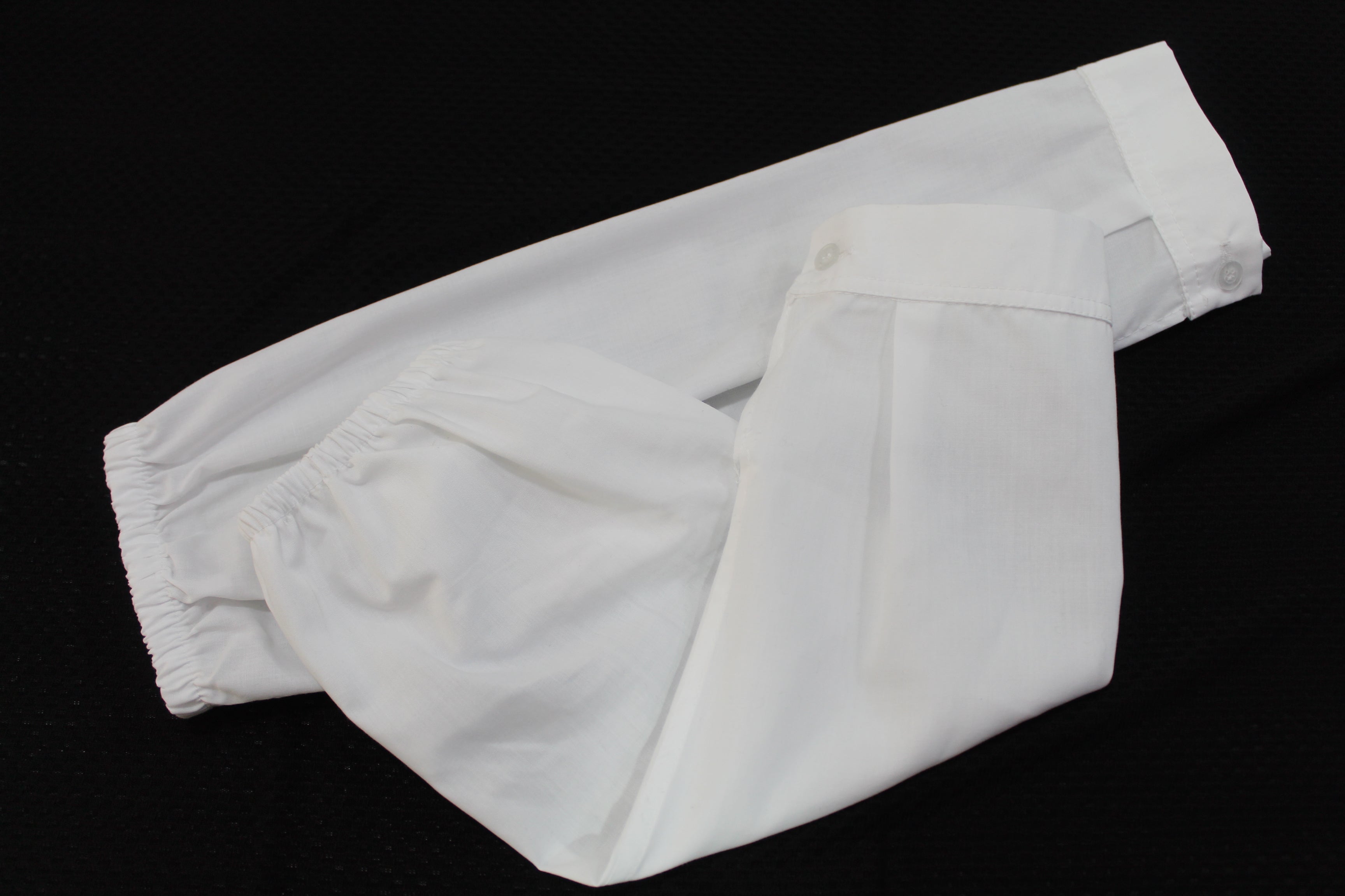 White cotton wrist extensions designed for full coverage and comfort